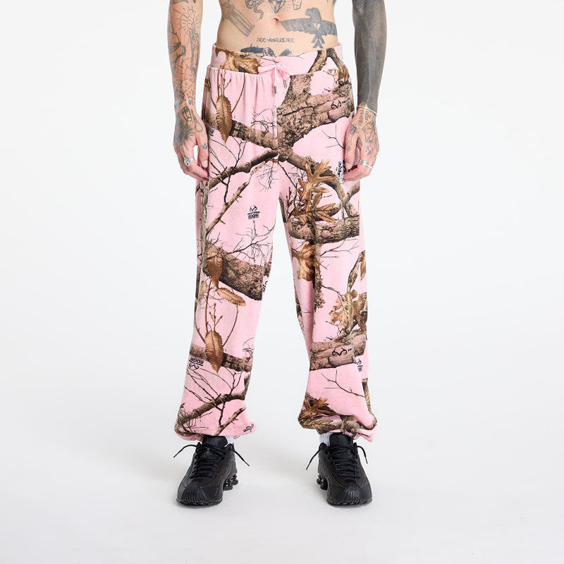 PLEASURES Realtree Velour Track Pants Pink Edge
